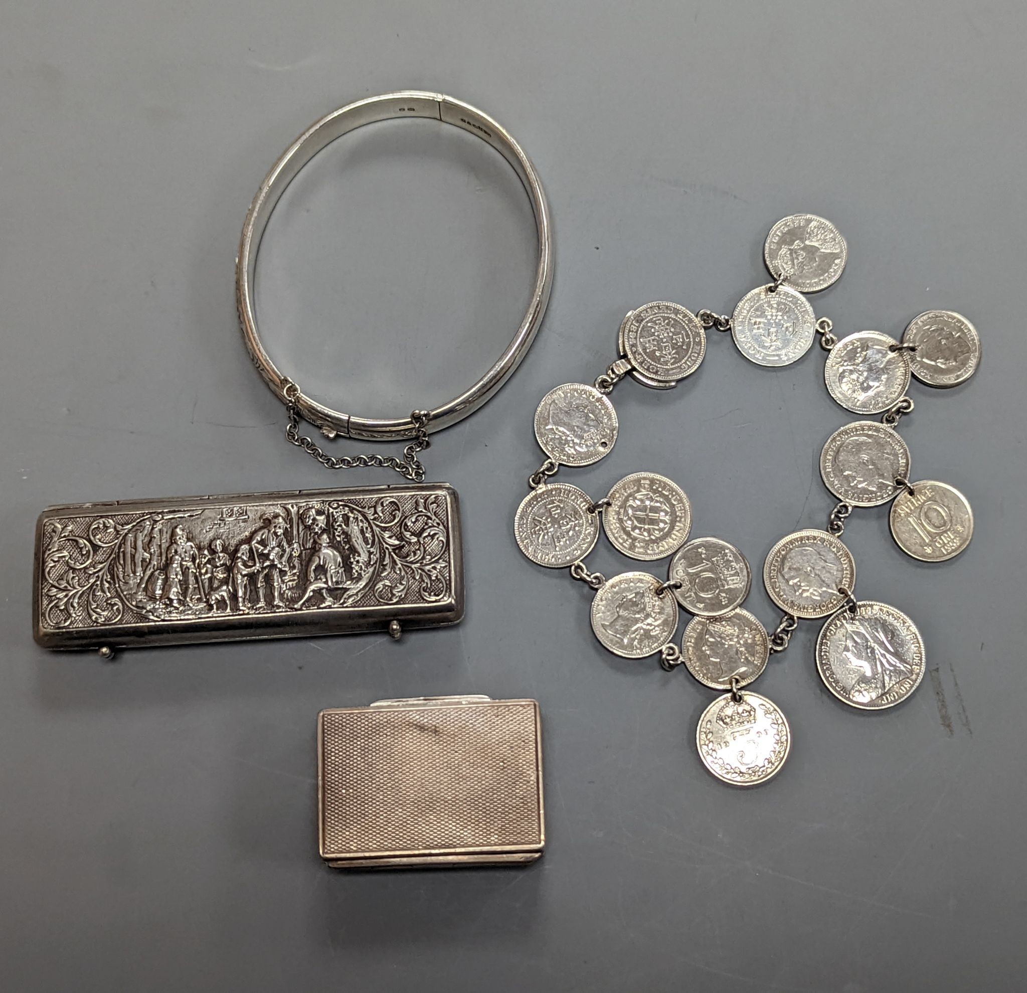 Two Austro Hungarian white metal snuff boxes, a bracelet and coin bracelet.